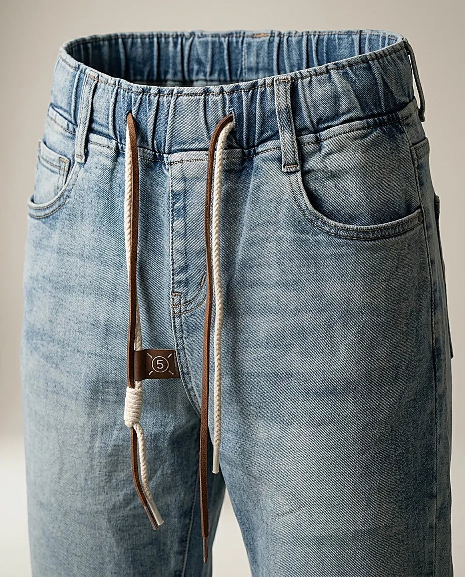 Blugi damă casual stil jogger cu talie elastică și șnur, denim albastru deschis, rulați la gleznă