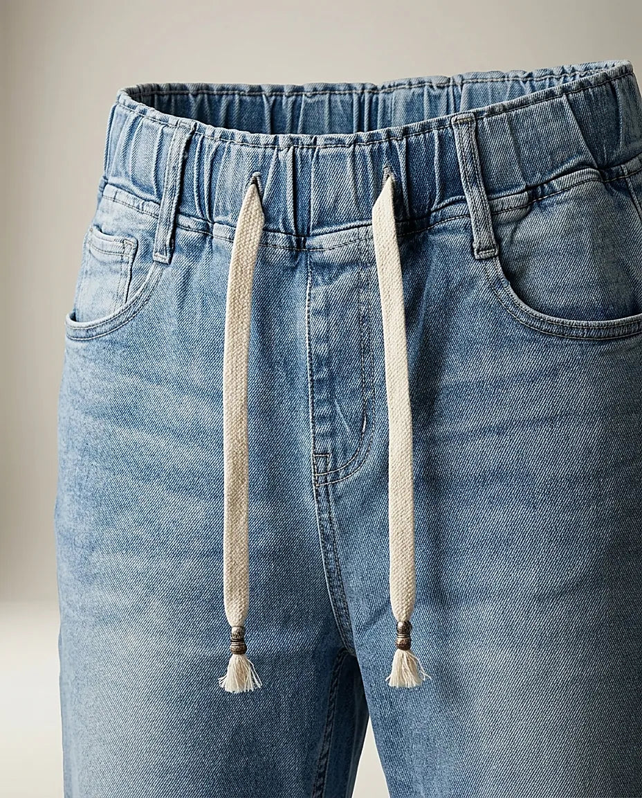 Blugi de damă cu talie elastică și șnur, model conic din denim prespălat, ideali pentru ținute casual-moderne