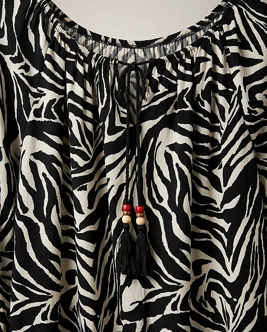 Bluză damă casual cu imprimeu zebra, mânecă lungă bufantă și decolteu elastic cu ciucuri