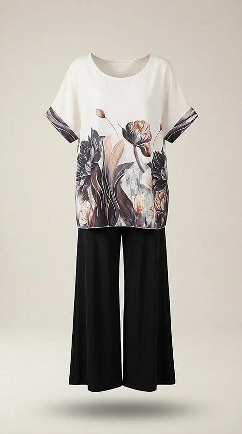 Compleu elegant de damă din două piese cu pantaloni palazzo negri și bluză ivoire cu imprimeu floral artistic