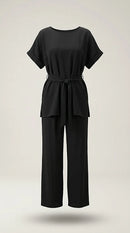 Compleu elegant negru de damă din două piese, cu top lejer cu cordon în talie și pantaloni largi, ținută versatilă casual-chic