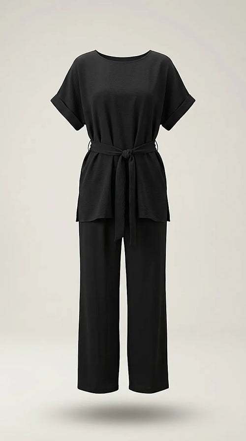 Compleu elegant negru de damă din două piese, cu top lejer cu cordon în talie și pantaloni largi, ținută versatilă casual-chic
