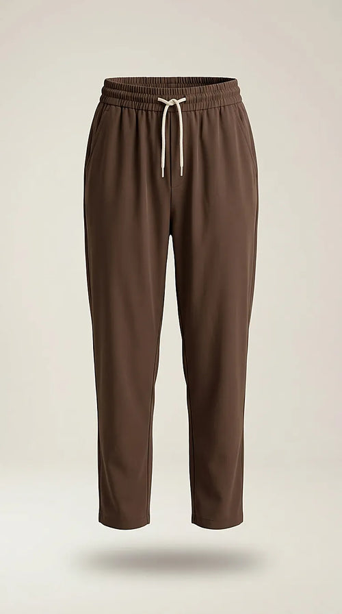 Pantaloni casual de damă maro ciocolatiu cu talie elastică și șnur, model conic confortabil, ideal pentru ținute de zi sau office-casual