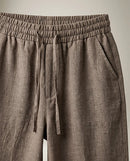 Pantaloni casual maro cu talie elastică și șnur, model lejer cu aspect de in pentru femei