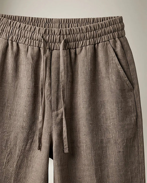 Pantaloni casual maro cu talie elastică și șnur, model lejer cu aspect de in pentru femei