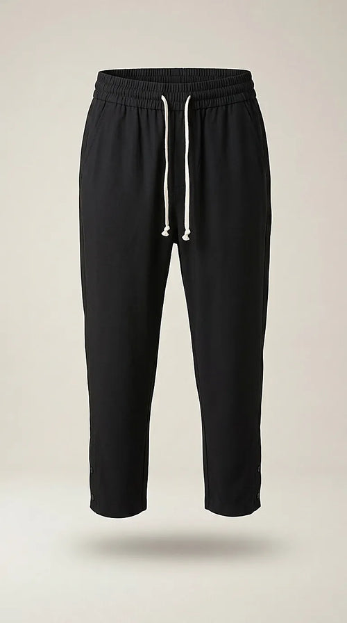 Pantaloni jogger negri de damă cu talie elastică și șnur alb, model casual relaxed fit, perfecți pentru ținute lejere de zi