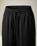 Pantaloni negri de damă cu talie elastică și șnur, croială dreaptă, lejeri și eleganți, perfecți pentru ținute casual-chic