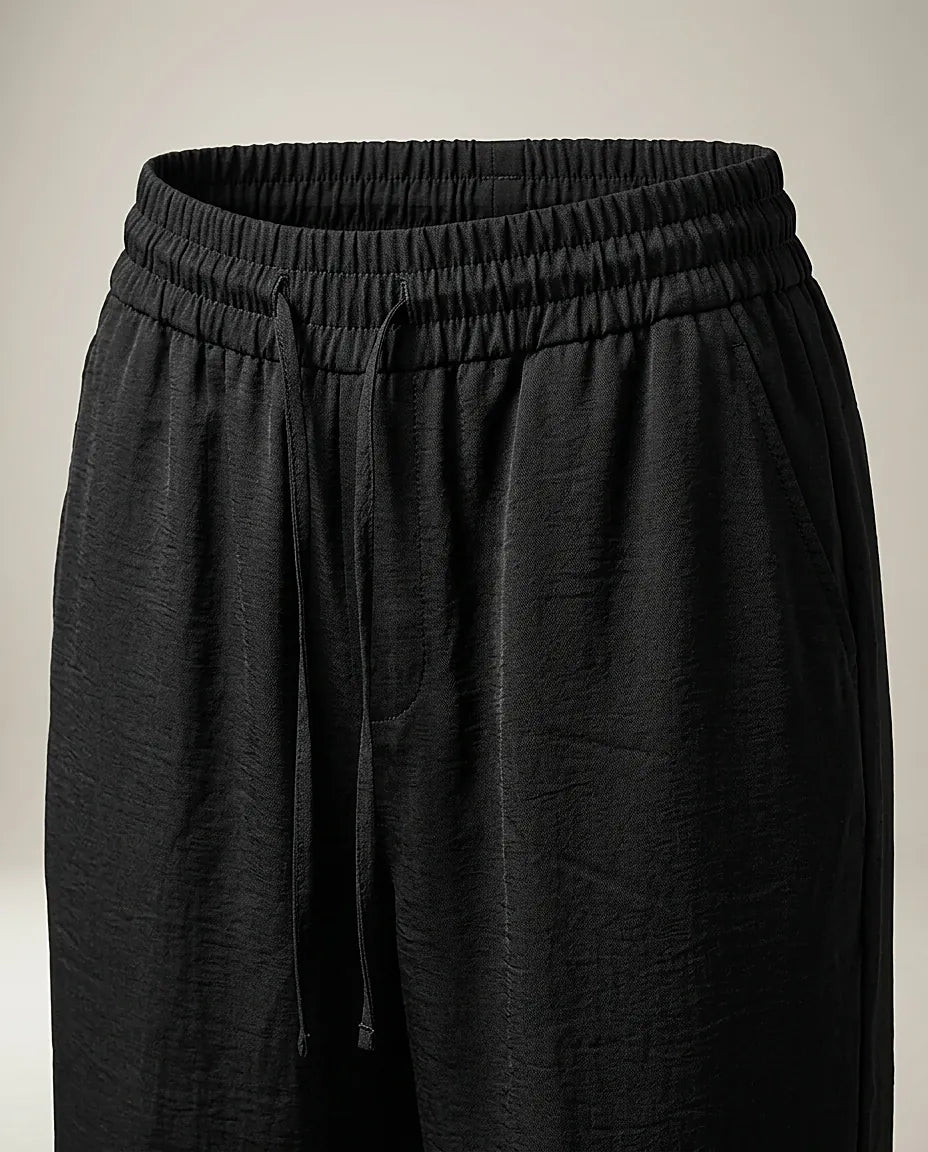 Pantaloni negri de damă cu talie elastică și șnur, croială dreaptă, lejeri și eleganți, perfecți pentru ținute casual-chic
