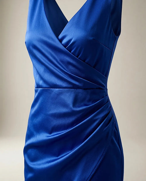 Rochie scurtă de ocazie albastru regal, din material satinat, cu design petrecut și drapaj lateral
